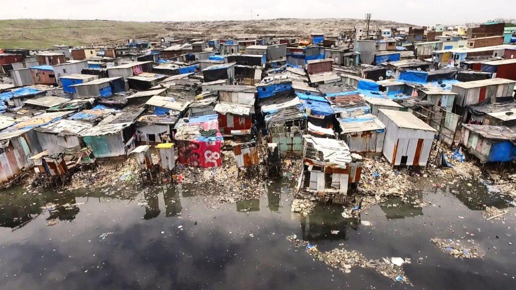 an image of urban slums in mumbai