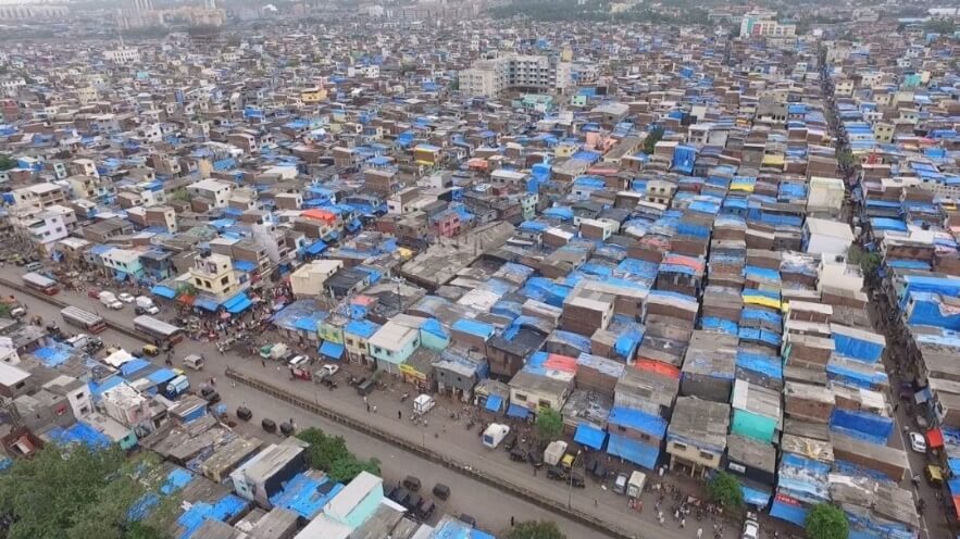 an image of urban slums in mumbai