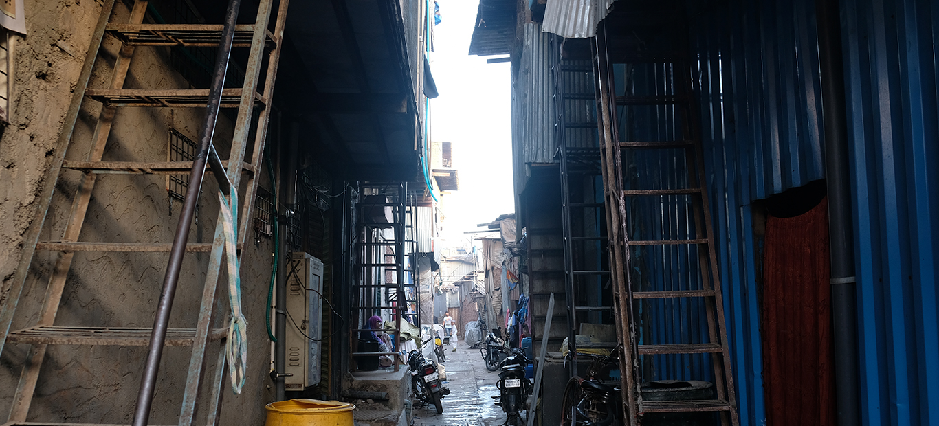 an image of an alley in urban slums of Mumbai